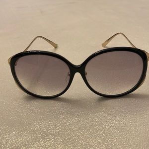 Brand New condition. Black frames with Gold-arms with Red & Green